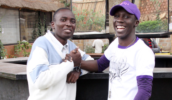 Record TV Katogo presenter, Douglas with Moses at Virgin Island Bugolobi