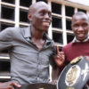 Ronald Mugula (left) a kickboxing champion hangs with fan Lubega Edrin. Photo By Ismail Kezaala