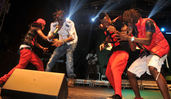 Goodlyf and P square during a stage performance