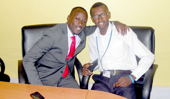 Malcolm meets Charles at NTV. PHOTO BY ISAAC SSEJJOMBWE