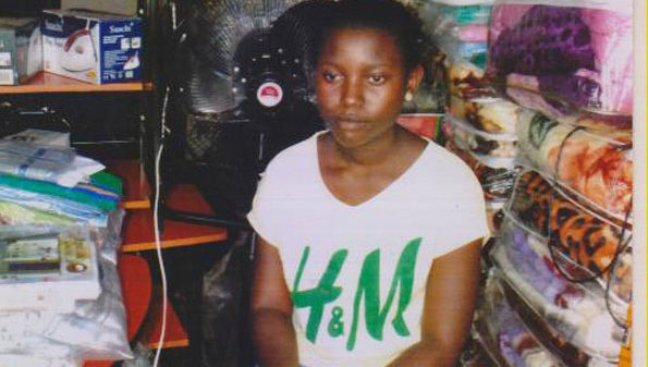 Nanyonjo in her shop. PHOTO BY ISAAC SSEJJOMBWE