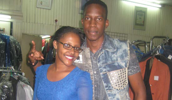 Bakri (R) and his fan Sue Naiga. PHOTO BY ISAAC SSEJJOMBWE
