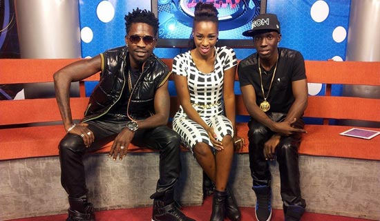 Lwanga (R), in the NTV studios with musicians Bobi Wine and Cindy.