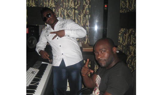 Nash Wonder (L) and Mukasa in Monster Studios. PHOTO BY ISAAC SSEJJOMBWE