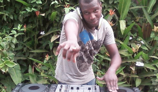 Faisal on the turntables. PHOTO BY ISAAC SSEJJOMBWE