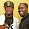 GNL Zamba (L) poses with Eugene Kawooya . PHOTO BY ISAAC SSEJJOMBWE