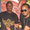 Navio (L) gave his fan Okuru a Navcorp T-Shirt. PHOTO BY ISAAC SSEJJOMBWE