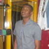 Onjima in his boutique, Fashion Bay, at Equatorial Shopping Mall. PHOTO BY ISAAC SSEJJOMBWE