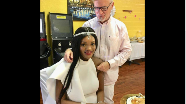 Aisha Salma Nassanga poses for a photo with her husband, during the baby shower yesterday