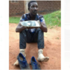 Qute Kaye holding the headlight that he was caught stealing