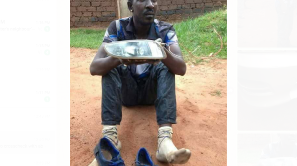 Qute Kaye holding the headlight that he was caught stealing