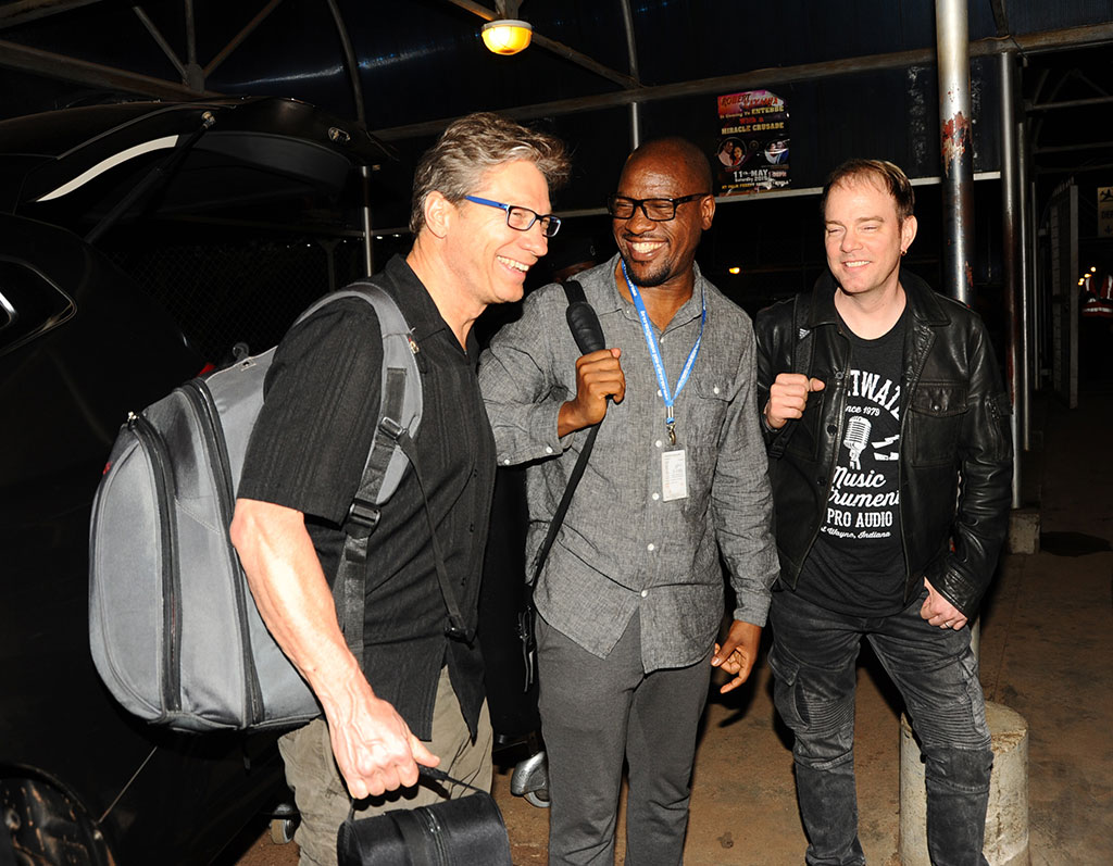 Jazz producer Chris Lang(L) saxophonist Isaiah Katumwa (C) and saxophonist Darren Rahn (R) on arrival at Entebbe Aiport on Tuesday night. (PHOTO BY EDDIE CHICCO)